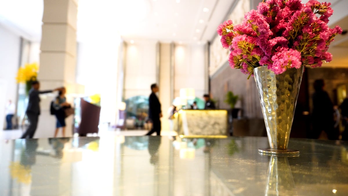 Luxury hotel lobby with polished marble floors